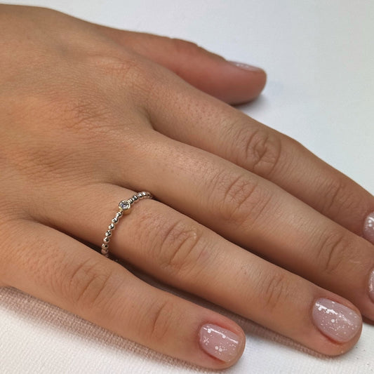 Zilveren balletjes ring met diamant