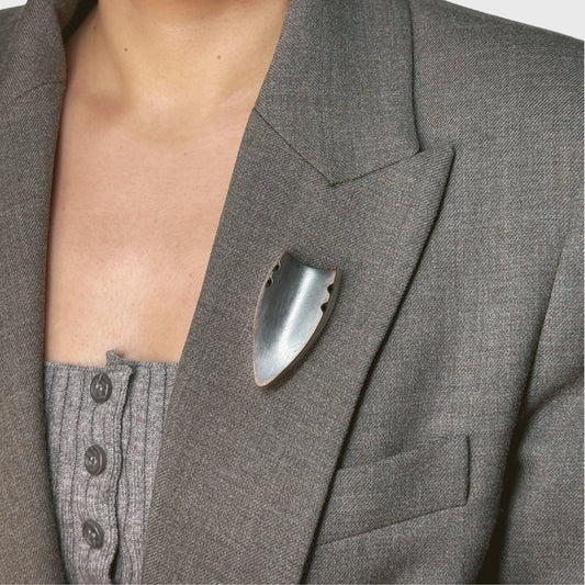 Broche van koper met zilveren kader