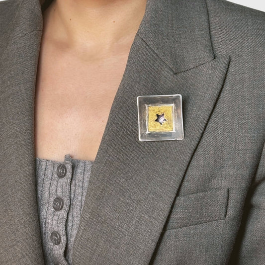 Zilveren broche met bladgoud ster