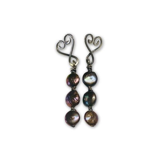 Zilveren harten met zwarte platte parelbengels