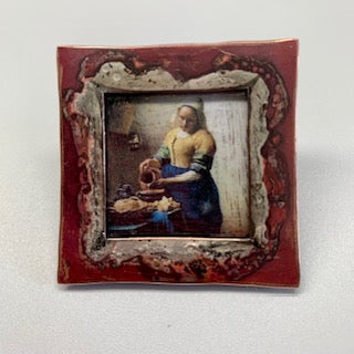 Broche met het melkmeisje