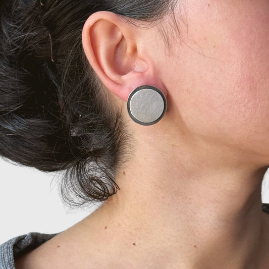 Zilveren zwevende rondel oorbellen