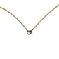 Een verguld collier met gouden hartje