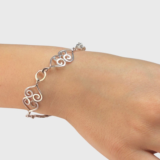 Unieke schakelarmband met harten en stevige ogen