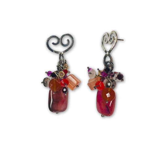 Trosje oorbellen aan zilveren harten